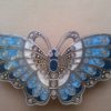 Pasador esmaltado de Menorca mariposa azules.